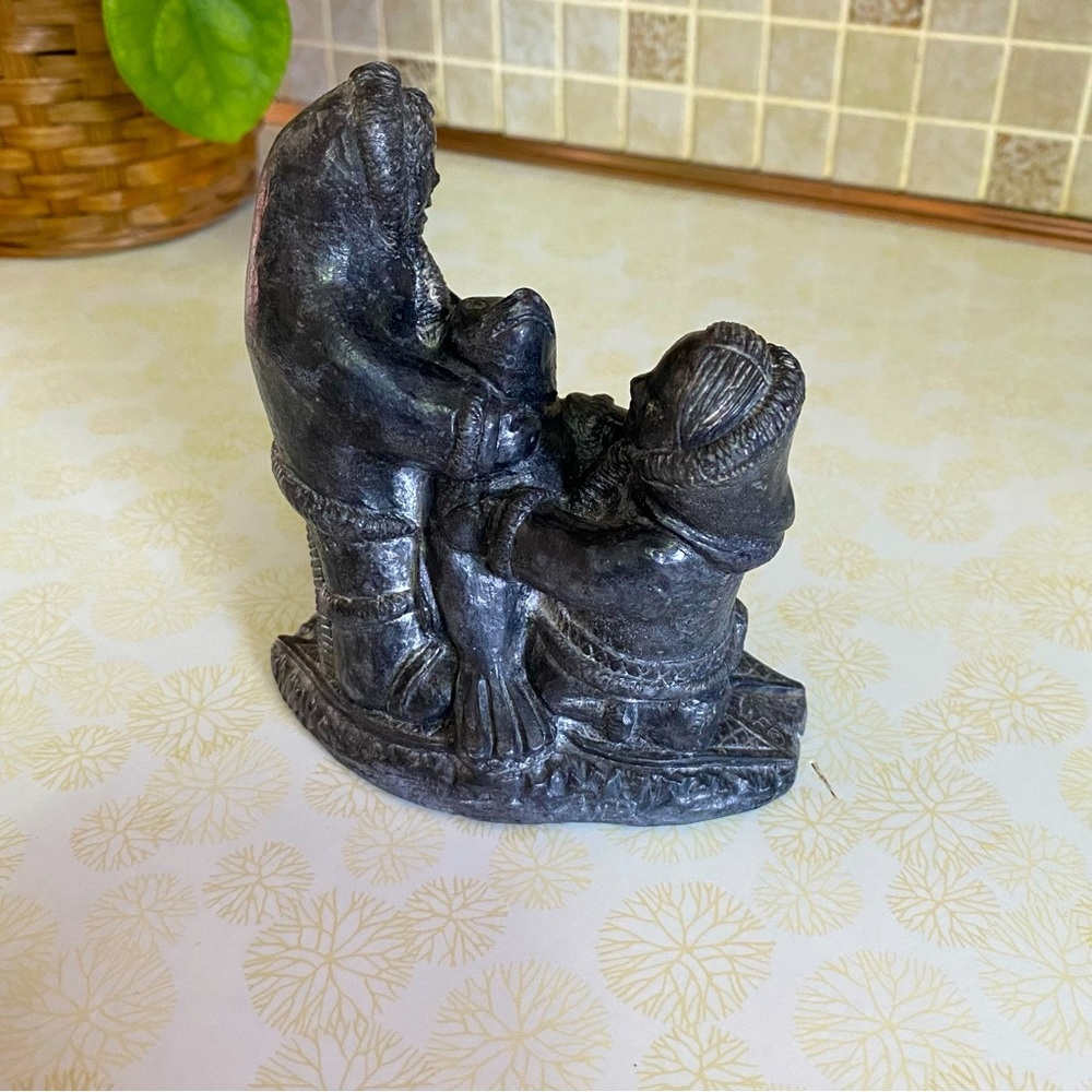 Vintage Wolf Originals Inuit Eskimo couple and seal sculpture soap stone carving